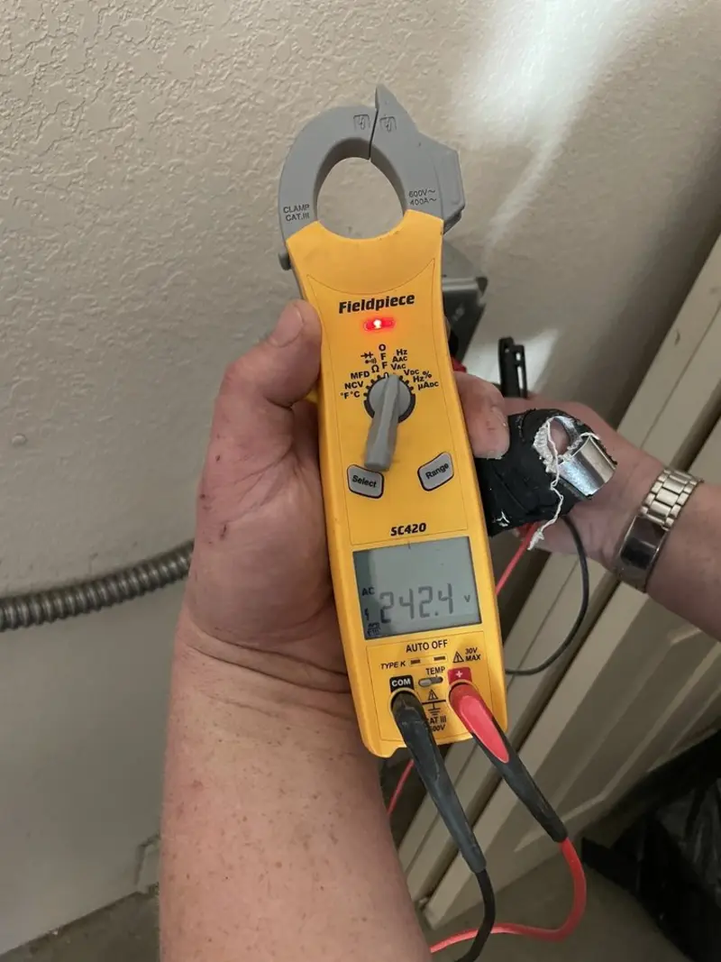 Voltage testing with clamp meter during Generator Installation in Leitchfield